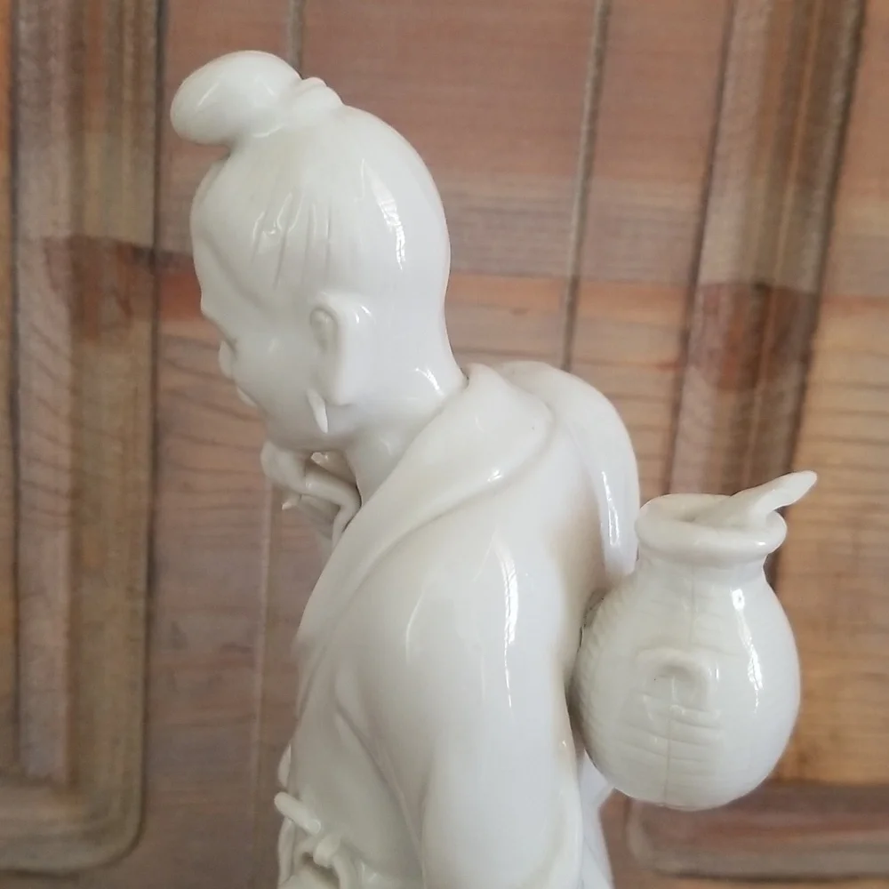 Vintage Asian Fisherman Figurine